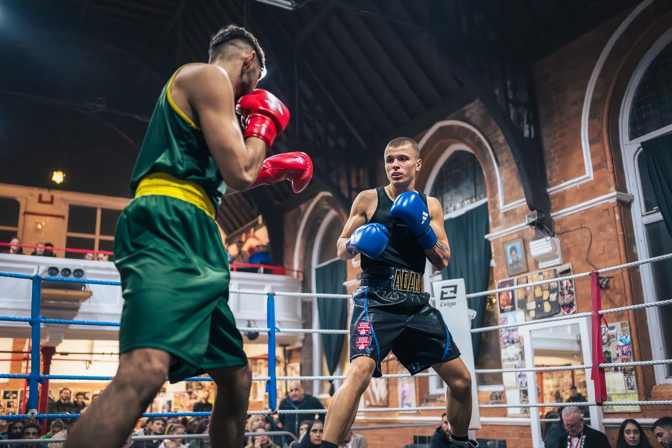 Adam competing in the boxing ring