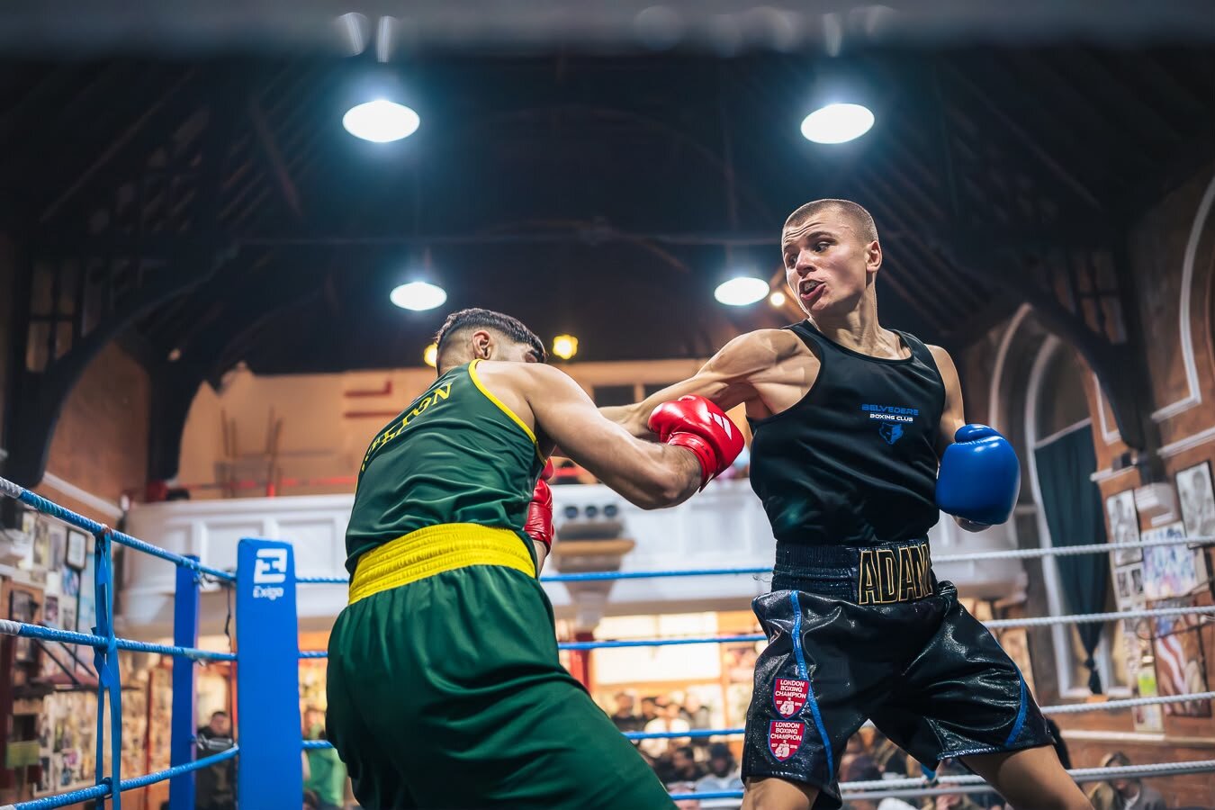 Adam landing a punch in competition